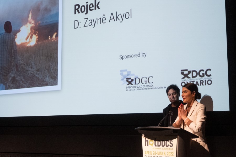 Zayne Akol accepting the DGC Special Jury Prize at Hot Docs